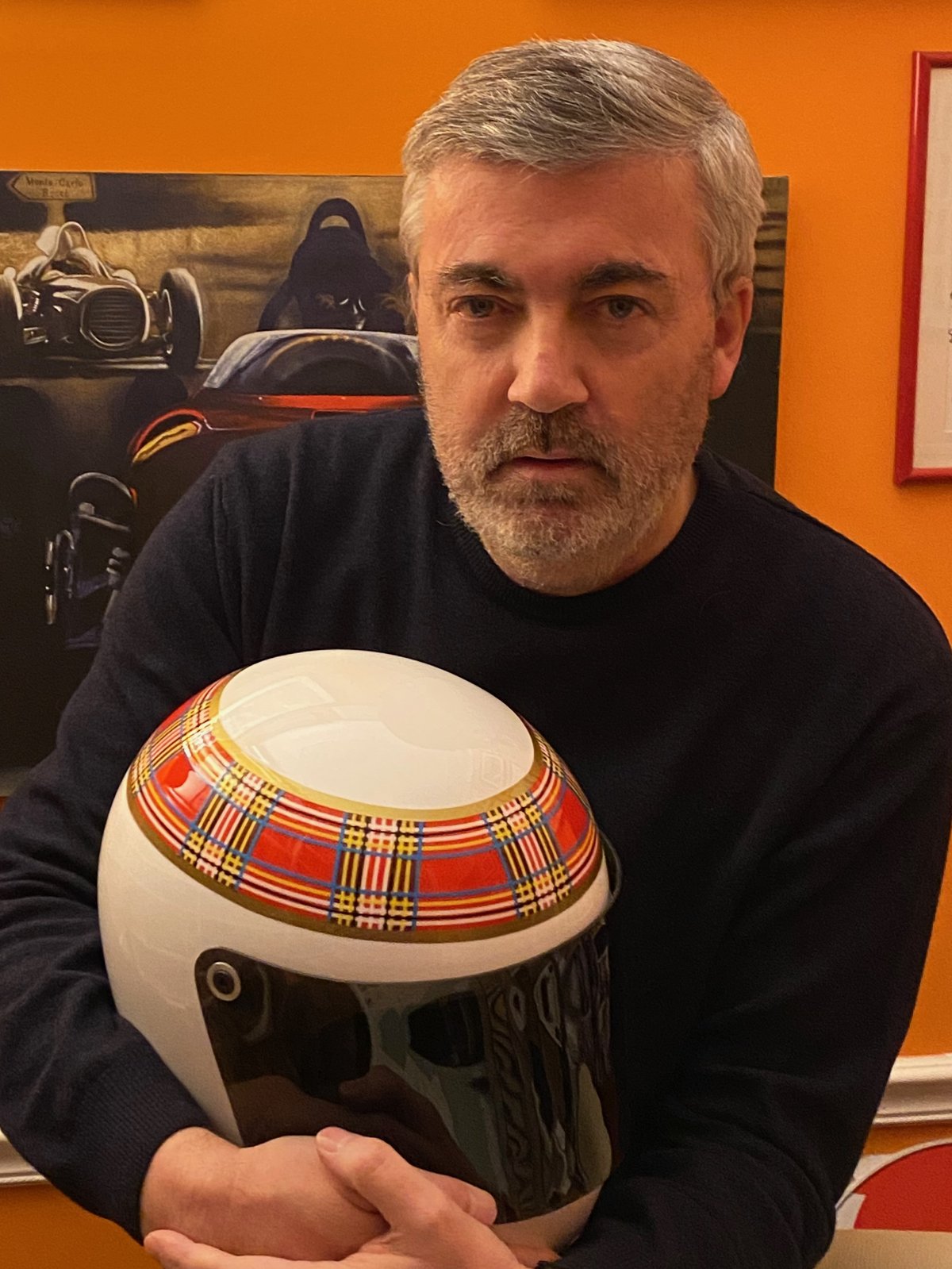 Luca Dal Monte with a vintage racing helmet
